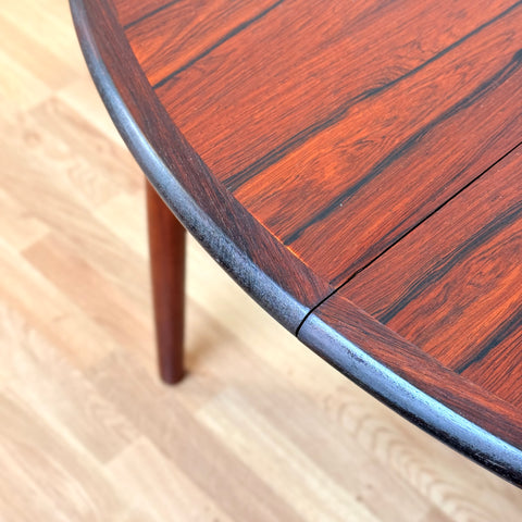 Danish round dining table in Santos rosewood by CJ Rosengarden
