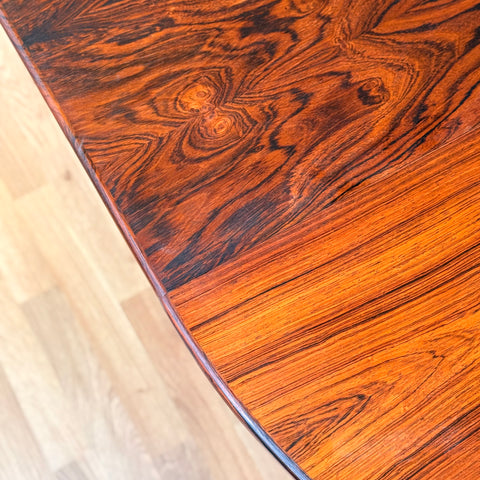 Danish round dining table in Santos rosewood