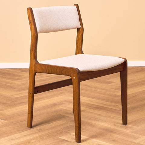 Danish dining chairs in walnut by Farstrup
