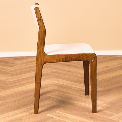 Danish dining chairs in walnut by Farstrup