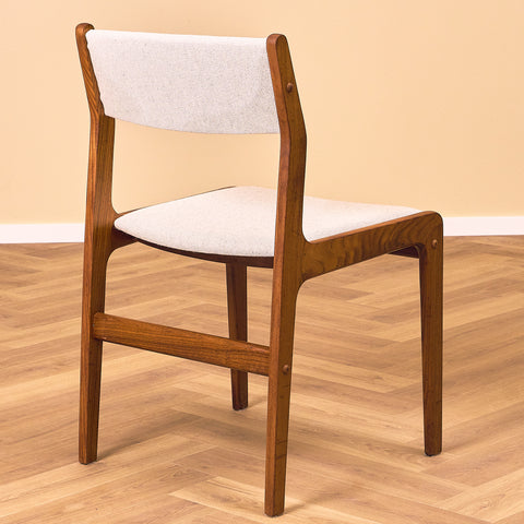 Danish dining chairs in walnut by Farstrup