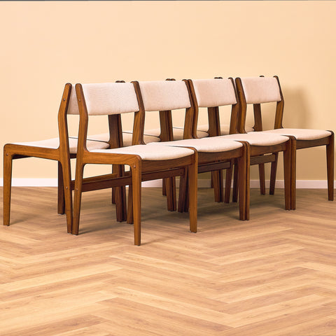 Danish dining chairs in walnut by Farstrup