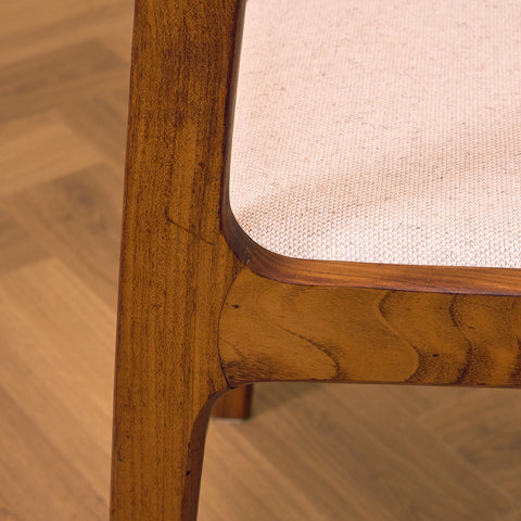 Danish dining chairs in walnut by Farstrup