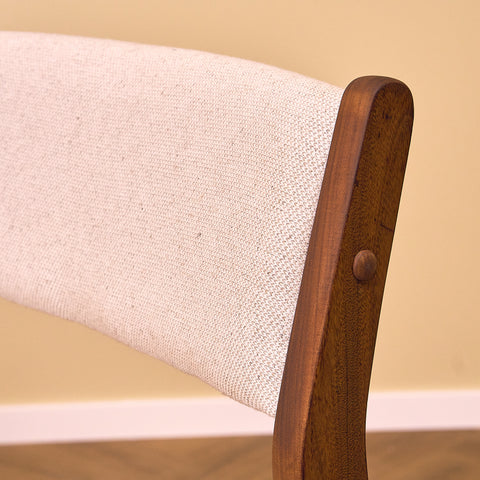 Danish dining chairs in walnut by Farstrup