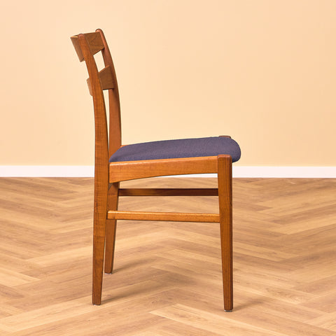 A set of 8 Swedish dining chairs in teak