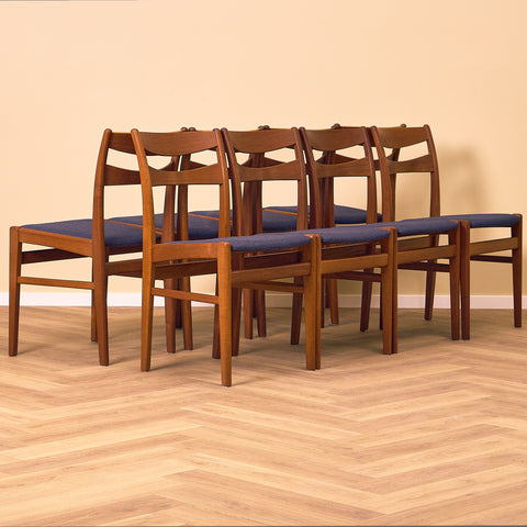 A set of 8 Swedish dining chairs in teak
