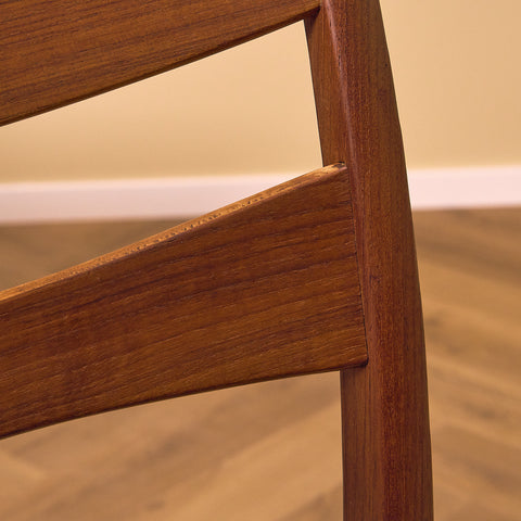 A set of 8 Swedish dining chairs in teak