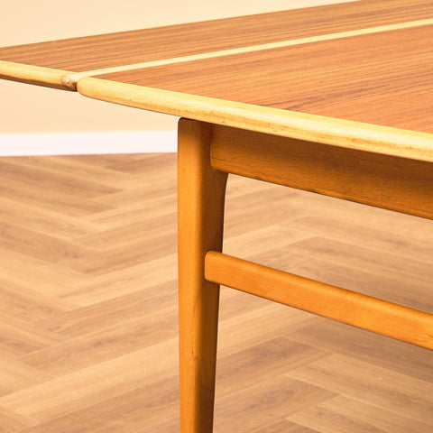 Swedish extendable coffee table in teak and beech