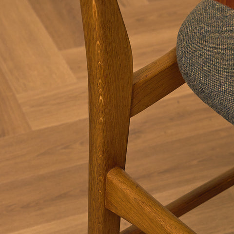 Dansk matstol i teak och ek av Ib Kofod-Larsen