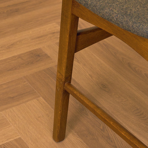 Dansk matstol i teak och ek av Ib Kofod-Larsen