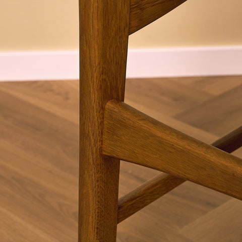 Dansk matstol i teak och ek av Ib Kofod-Larsen