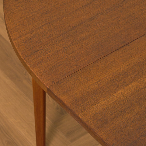 Swedish round dining table in stained teak