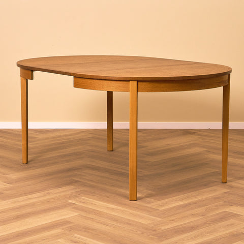 Swedish round dining table in teak by Nils Jonsson for Troeds