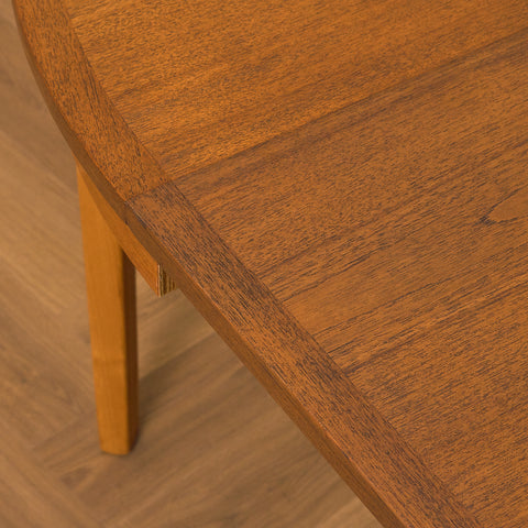 Swedish round dining table in teak by Nils Jonsson for Troeds