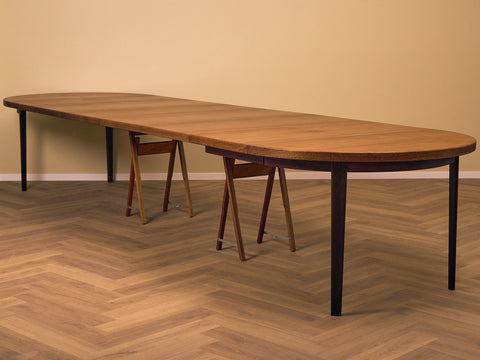 Rare Danish round dining table with 6 extensions in walnut