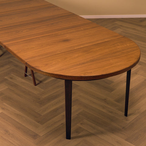 Rare Danish round dining table with 6 extensions in walnut