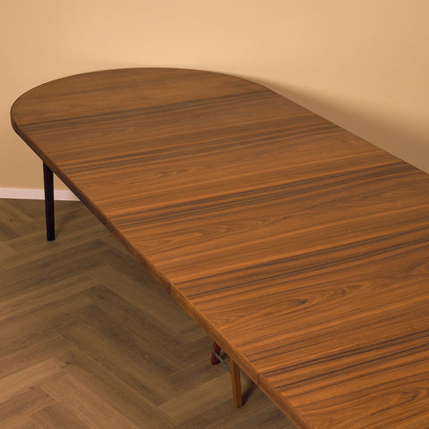 Rare Danish round dining table with 6 extensions in walnut