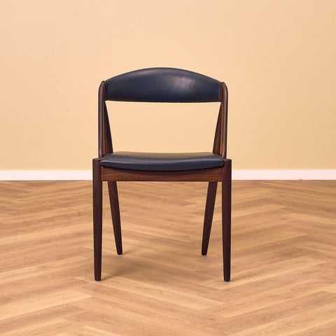 Danish dining chairs in walnut by Kai Kristiansen for Schou Andersen, model 31