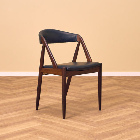 Danish dining chairs in walnut by Kai Kristiansen for Schou Andersen, model 31