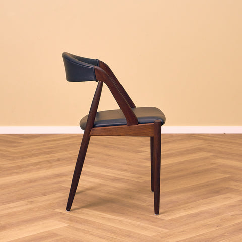 Danish dining chairs in walnut by Kai Kristiansen for Schou Andersen, model 31