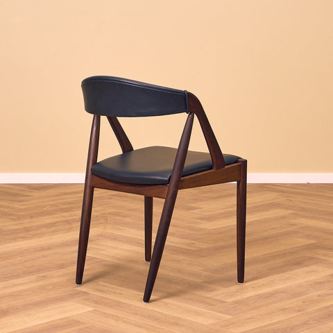 Danish dining chairs in walnut by Kai Kristiansen for Schou Andersen, model 31