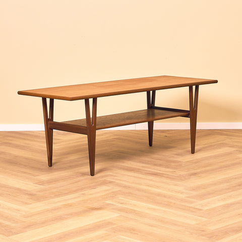 Danish coffee table in teak and walnut by Kurt Ostervig