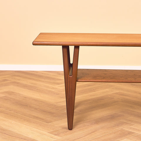Danish coffee table in teak and walnut by Kurt Ostervig
