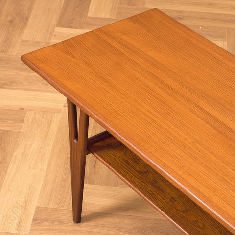 Danish coffee table in teak and walnut by Kurt Ostervig
