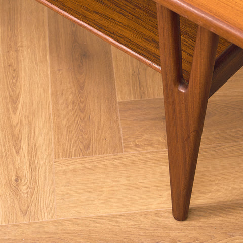 Danish coffee table in teak and walnut by Kurt Ostervig