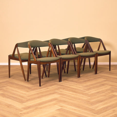 Danish dining chairs in walnut, model 31 by Kai Kristiansen