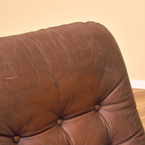 Fåtölj i läder och krom från mitten av århundradet