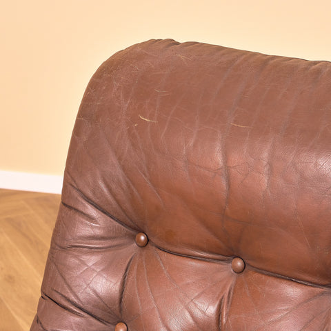 Fåtölj i läder och krom från mitten av århundradet