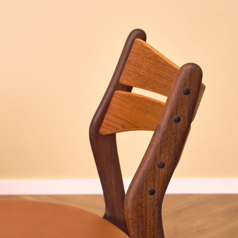 Danish dining chairs in solid walnut and teak by Erik Buch for Chr. Christensen Møbelfabrik, model 310