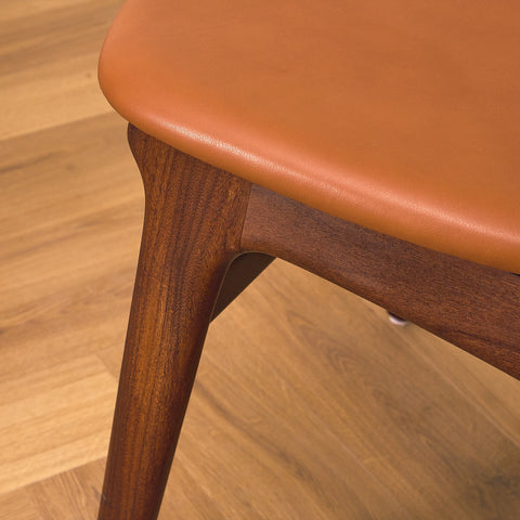 Danish dining chairs in solid walnut and teak by Erik Buch for Chr. Christensen Møbelfabrik, model 310