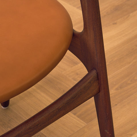 Danish dining chairs in solid walnut and teak by Erik Buch for Chr. Christensen Møbelfabrik, model 310