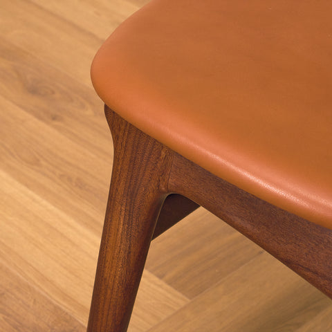 Danish dining chairs in solid walnut and teak by Erik Buch for Chr. Christensen Møbelfabrik, model 310