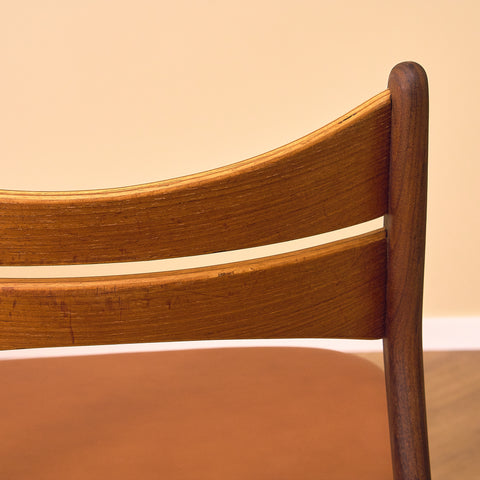 Danish dining chairs in solid walnut and teak by Erik Buch for Chr. Christensen Møbelfabrik, model 310