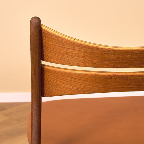 Danish dining chairs in solid walnut and teak by Erik Buch for Chr. Christensen Møbelfabrik, model 310