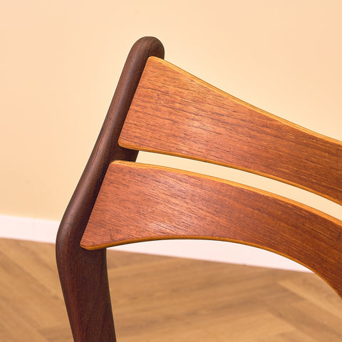 Danish dining chairs in solid walnut and teak by Erik Buch for Chr. Christensen Møbelfabrik, model 310