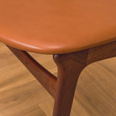 Danish dining chairs in solid walnut and teak by Erik Buch for Chr. Christensen Møbelfabrik, model 310