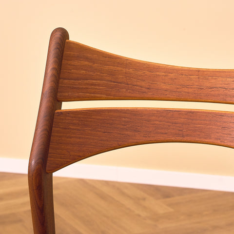 Danish dining chairs in solid walnut and teak by Erik Buch for Chr. Christensen Møbelfabrik, model 310