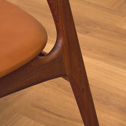 Danish dining chairs in solid walnut and teak by Erik Buch for Chr. Christensen Møbelfabrik, model 310