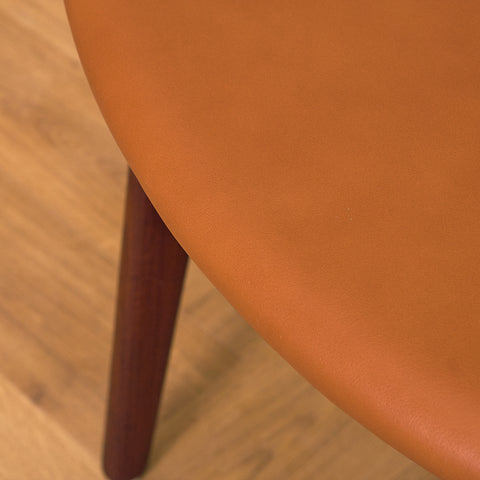 Danish dining chairs in solid walnut and teak by Erik Buch for Chr. Christensen Møbelfabrik, model 310