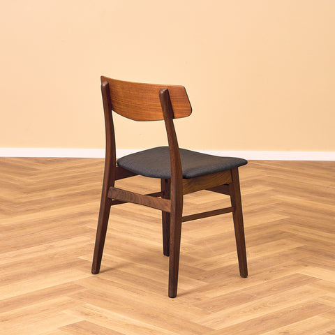 Dining chairs in teak & walnut by Farstrup