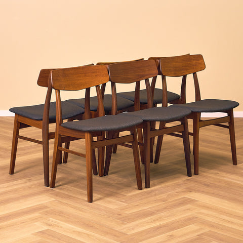 Dining chairs in teak & walnut by Farstrup