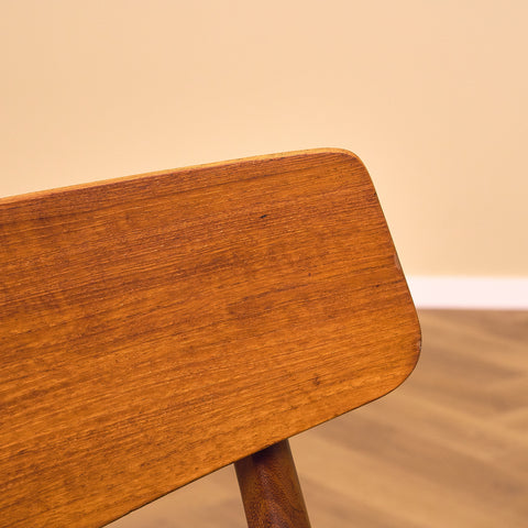 Dining chairs in teak & walnut by Farstrup