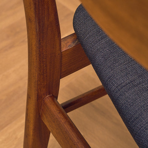 Dining chairs in teak & walnut by Farstrup