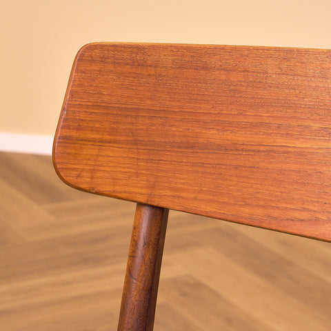 Dining chairs in teak & walnut by Farstrup