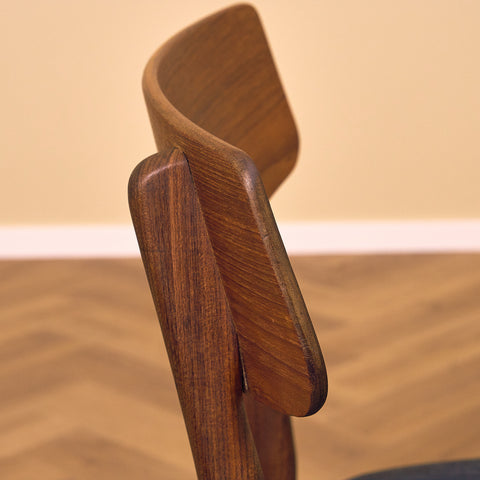 Dining chairs in teak & walnut by Farstrup