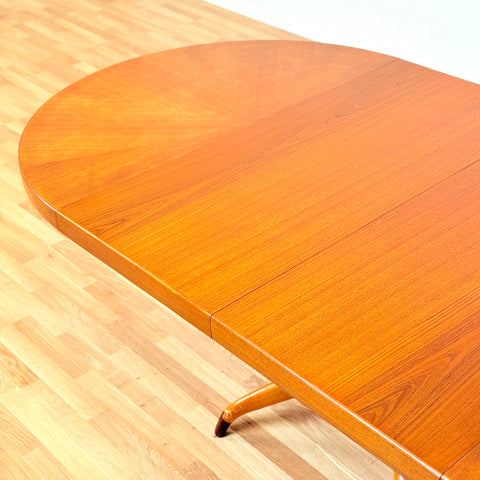 Swedish round dining table in teak by David Rosén for NK